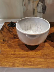 white and earth cup