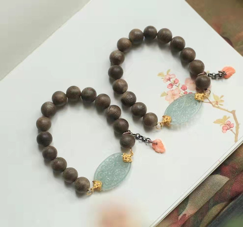 Natural Kalimantan Aloes Bai Qi Nan Craved Jade bracelet
