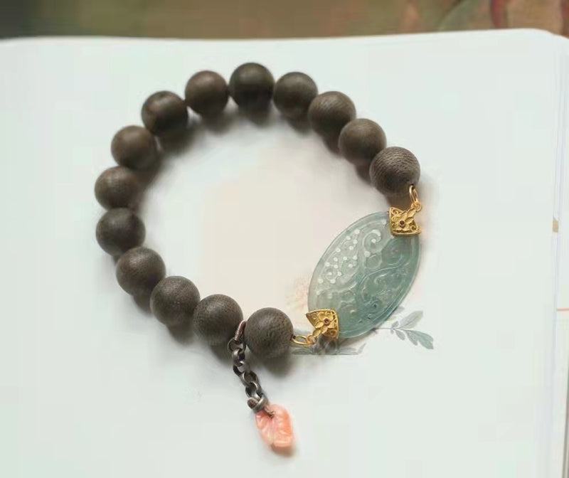 Natural Kalimantan Aloes Bai Qi Nan Craved Jade bracelet